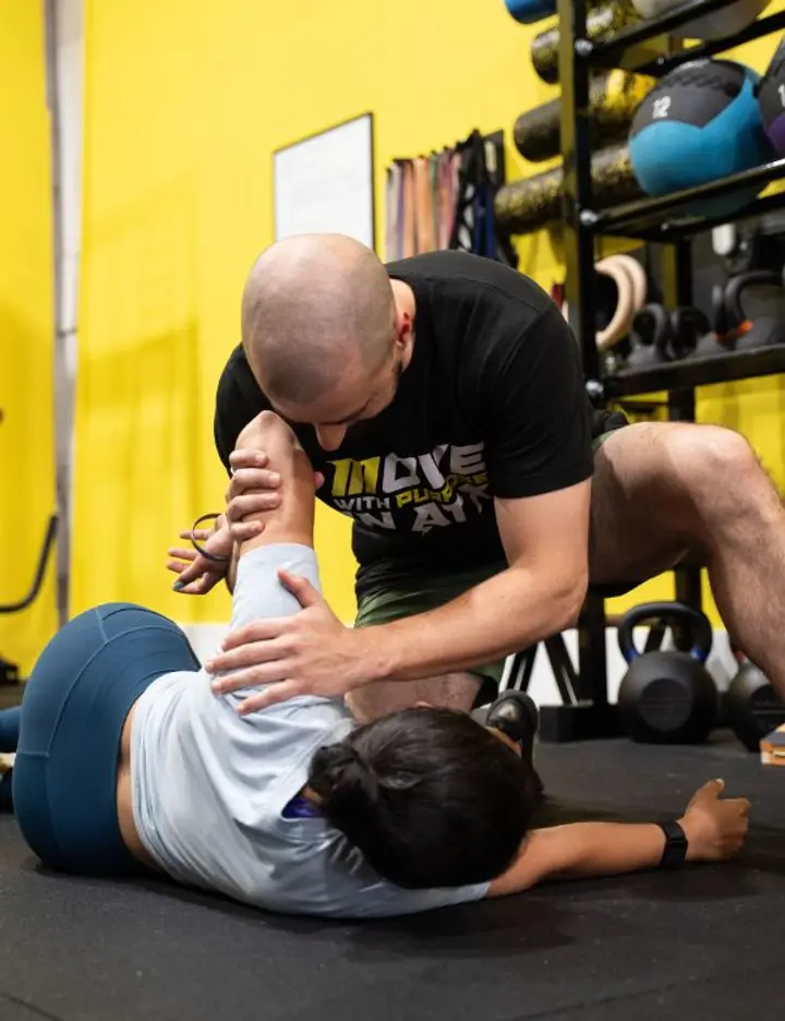 Motive Training client working through a joint mobility assessment